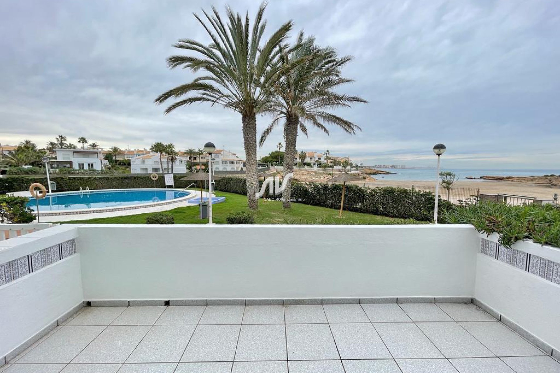 Frist line of the beach in Cabo Roig, Cala Capitan beach